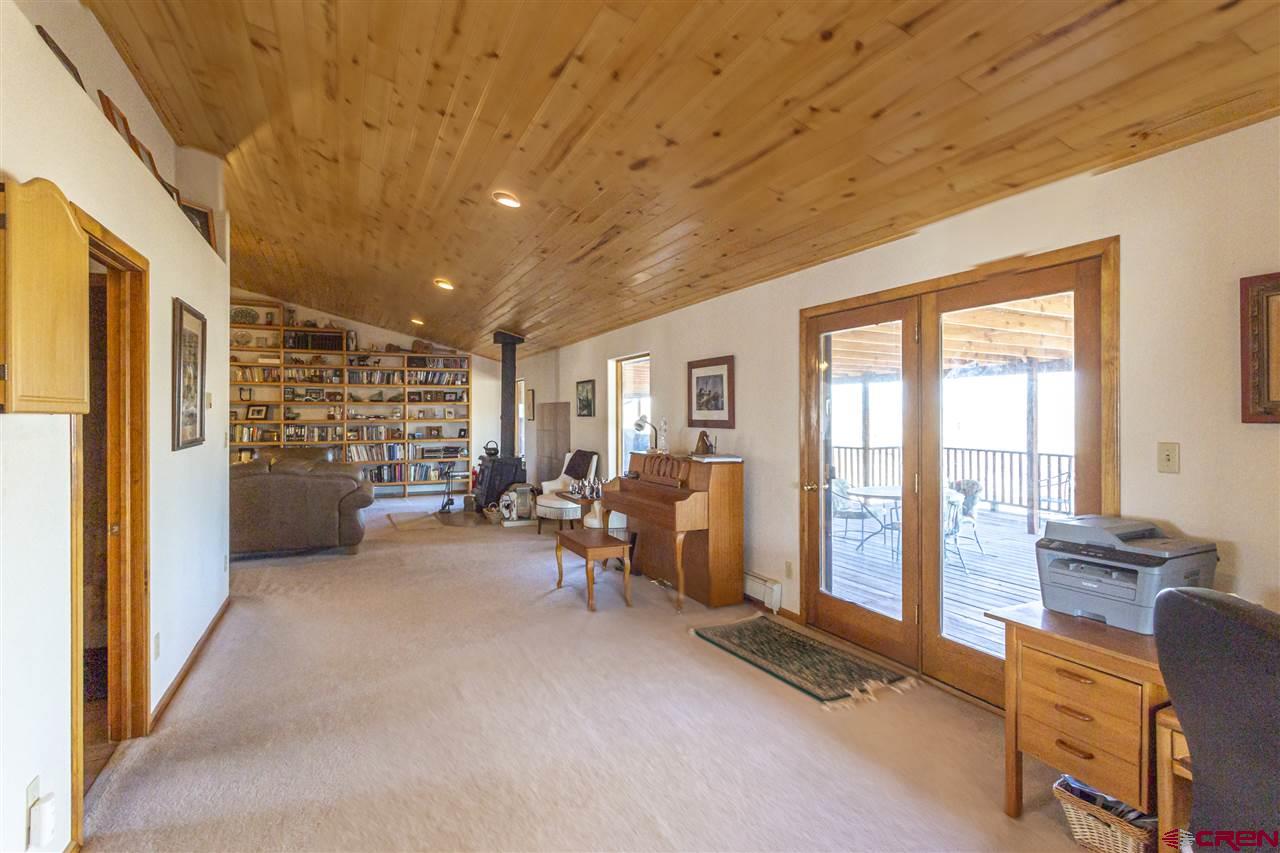 959 1200th Road Delta, CO 81416 - Photo 9 of 34 a view of a livingroom with furniture and a livingroom