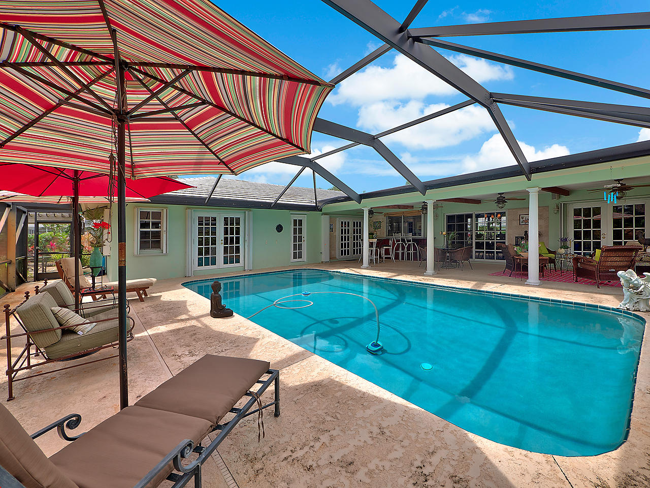 99 Golfview Drive Tequesta, FL 33469 - Photo 16 of 17 a balcony with table and chairs