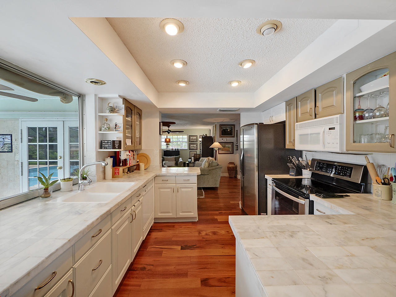 99 Golfview Drive Tequesta, FL 33469 - Photo 8 of 17 a large kitchen with stainless steel appliances lots of counter top space