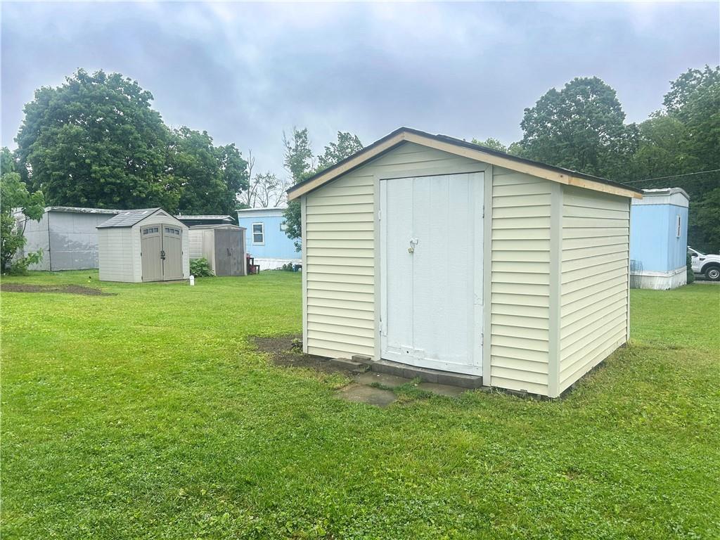 215 Maplecrest Drive Cabot, PA 16023 - Photo 14 of 15 a view of a house with a backyard