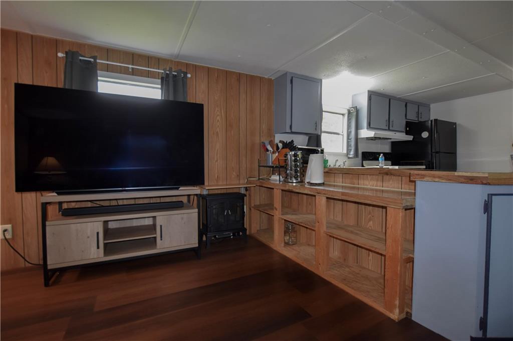215 Maplecrest Drive Cabot, PA 16023 - Photo 4 of 15 a kitchen with stainless steel appliances a stove microwave and cabinets