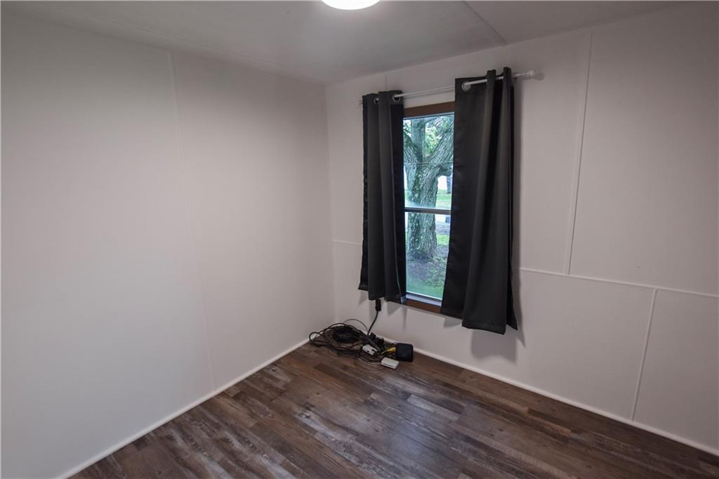 215 Maplecrest Drive Cabot, PA 16023 - Photo 9 of 15 wooden floor in an empty room