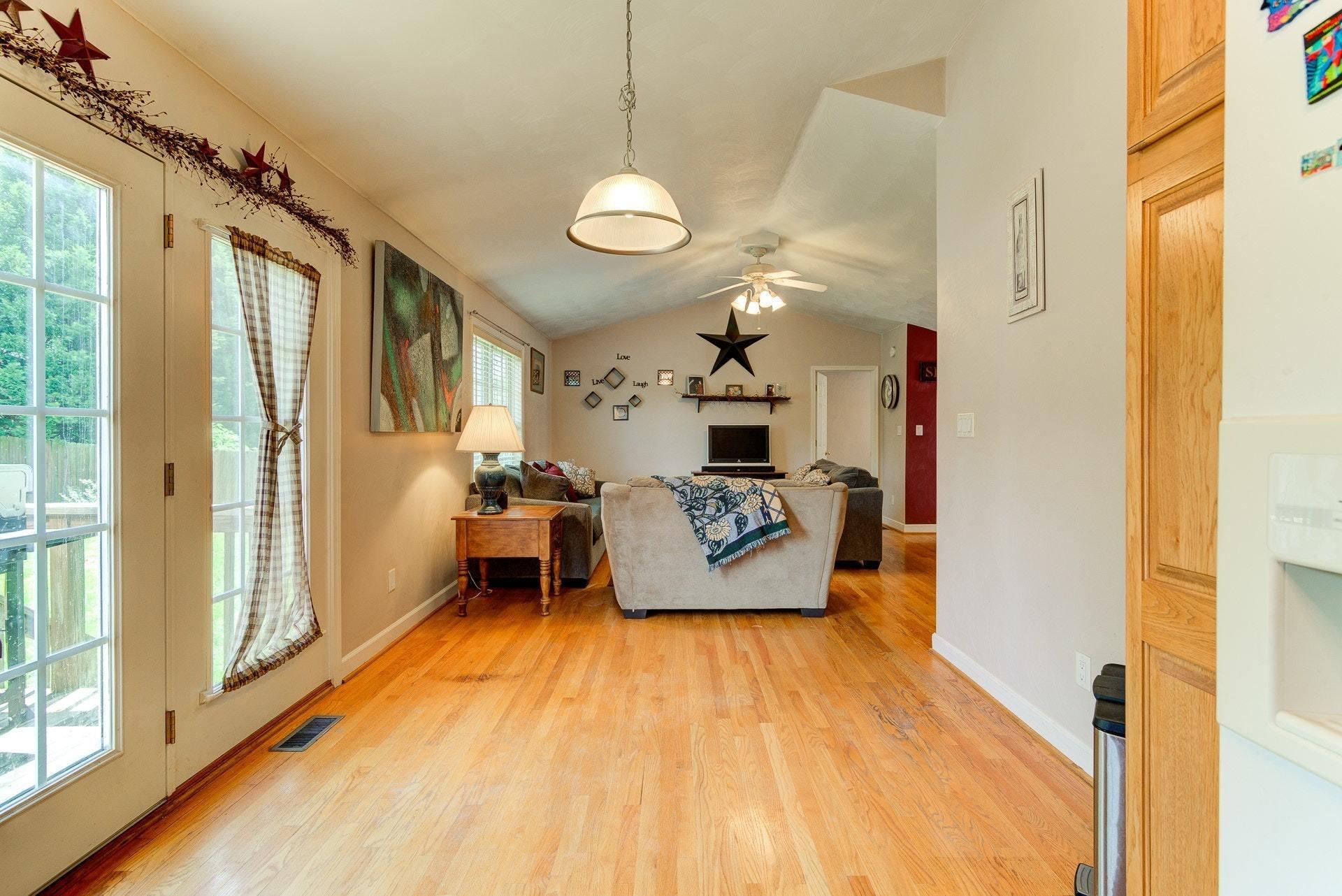 1744 Meadows Road Vinton, VA 24179 - Photo 11 of 36 a living room with furniture and a large window