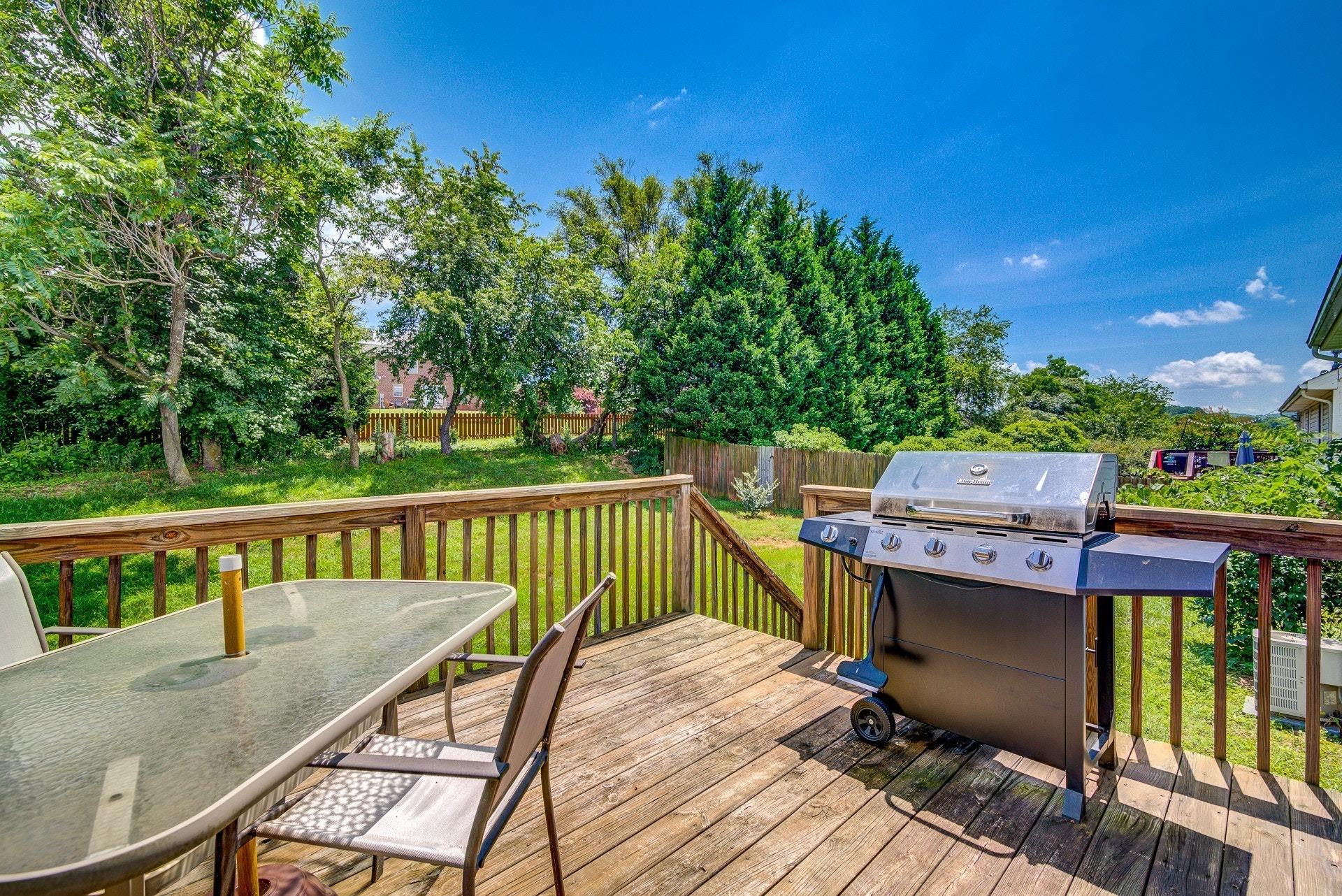 1744 Meadows Road Vinton, VA 24179 - Photo 12 of 36 a view of a patio with two chairs and a table