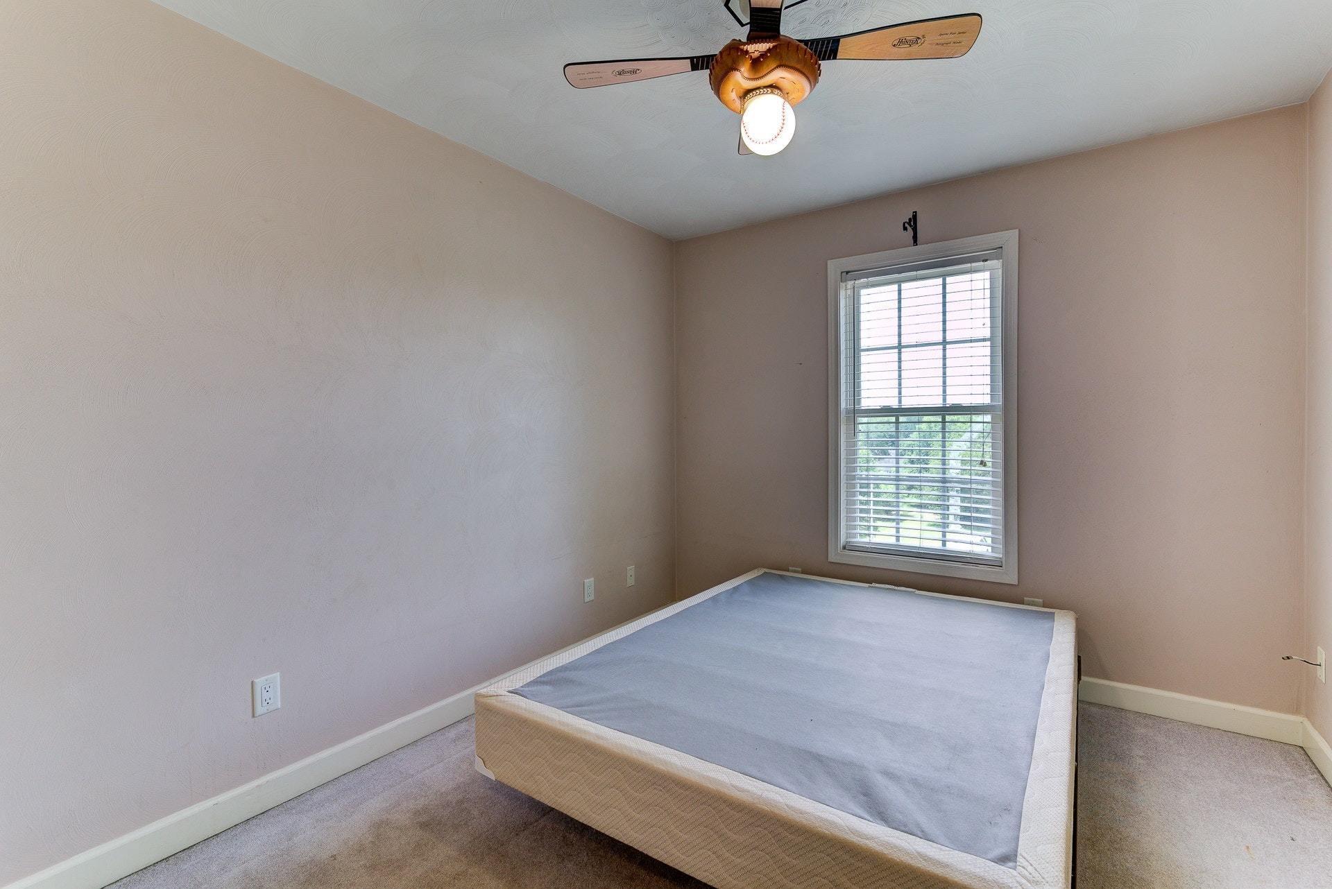 1744 Meadows Road Vinton, VA 24179 - Photo 17 of 36 an empty room with a window
