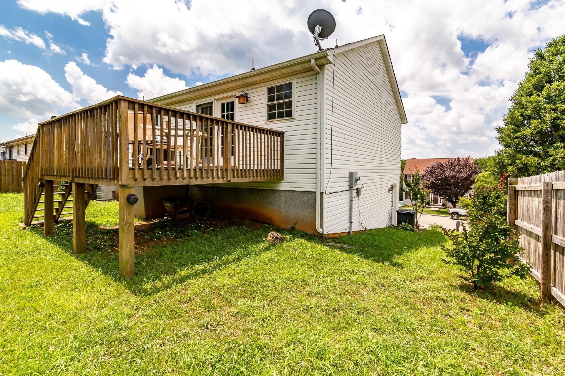 1744 Meadows Road Vinton, VA 24179 - Photo 32 of 36 a view of a house with backyard and sitting area