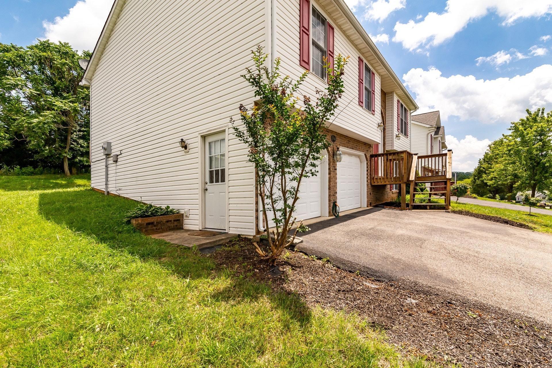 1744 Meadows Road Vinton, VA 24179 - Photo 33 of 36 a view of a house with backyard and a tree