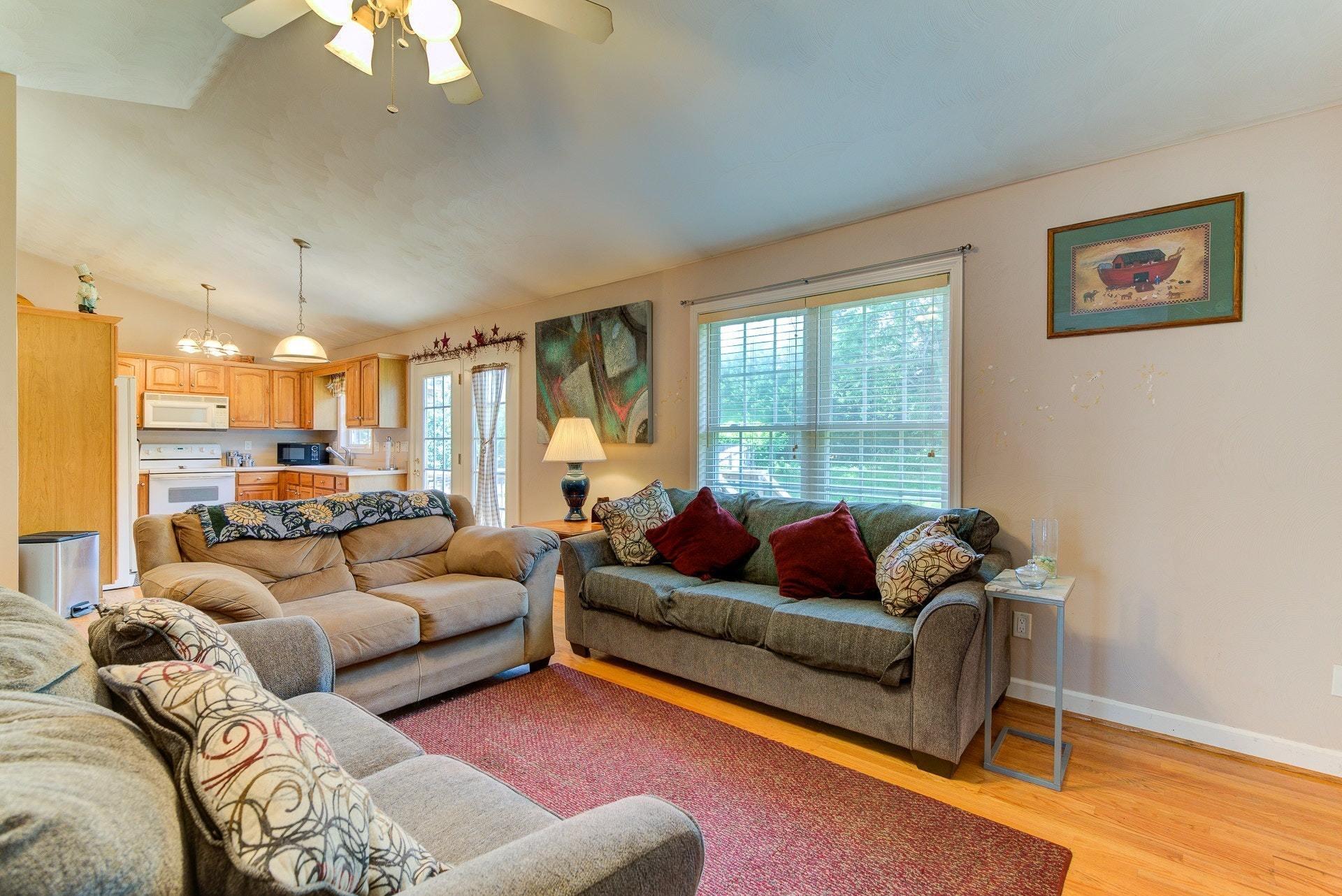1744 Meadows Road Vinton, VA 24179 - Photo 5 of 36 a living room with furniture and a large window