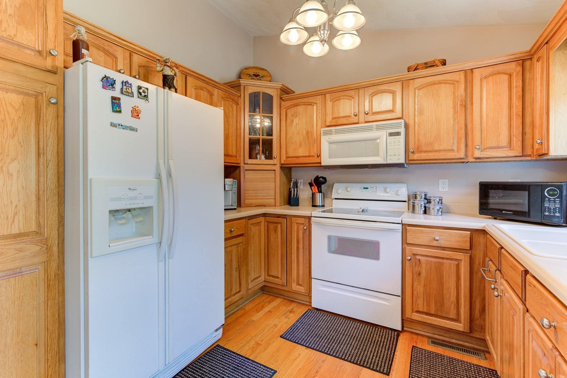 1744 Meadows Road Vinton, VA 24179 - Photo 9 of 36 a kitchen with stainless steel appliances a refrigerator sink and cabinets