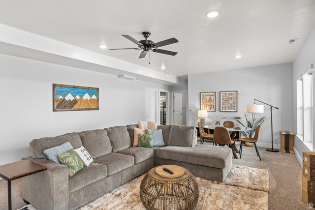 1343 North Trapper Loop Garden City, UT 84028 - Photo 30 of 56 Living room with carpet flooring, a ceiling fan, plenty of natural light, and recessed lighting