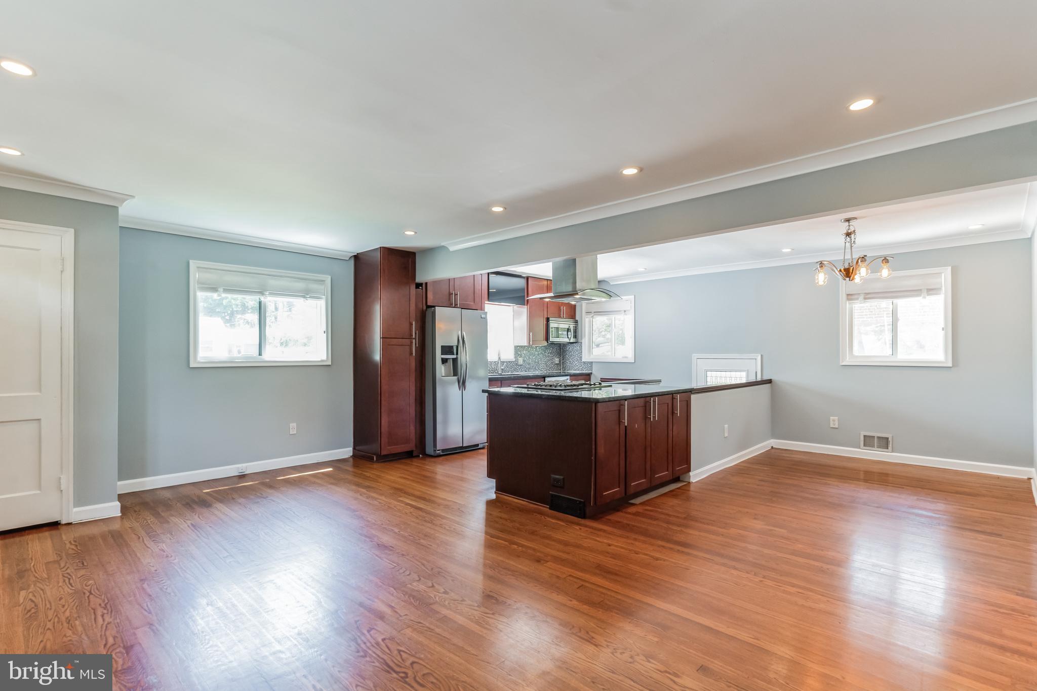 1316 South Buchanan Street Arlington, VA 22204 - Photo 12 of 28 a view of kitchen with wooden floor and window