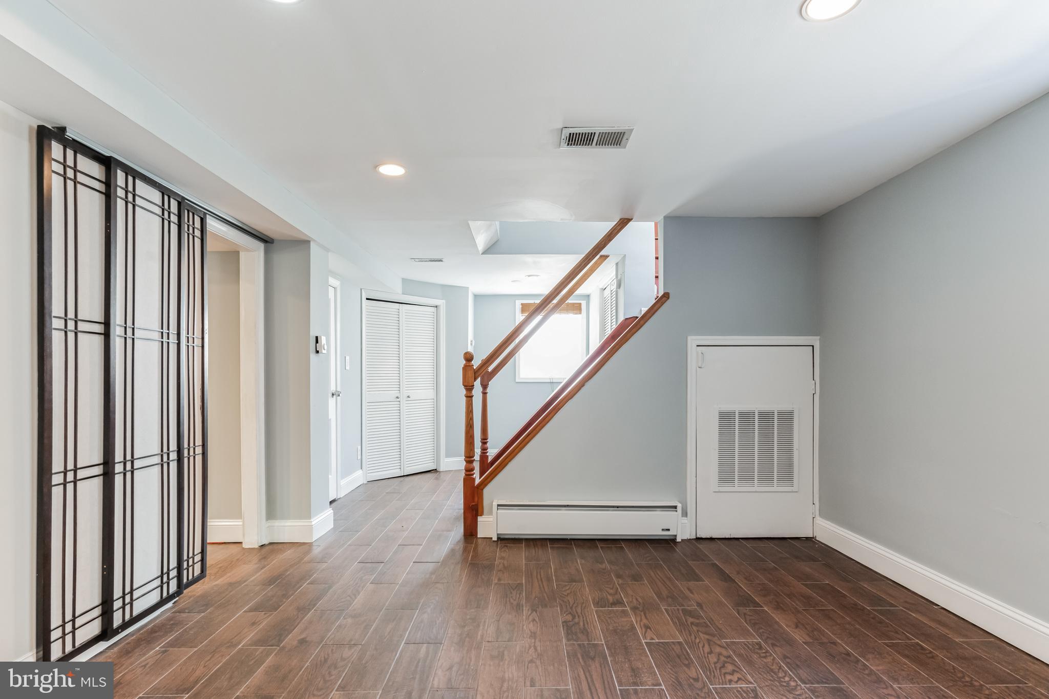 1316 South Buchanan Street Arlington, VA 22204 - Photo 26 of 28 a view of entryway with wooden floor