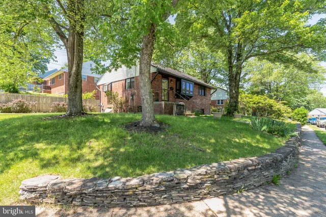 a kitchen with stainless steel appliances granite countertop a stove and a refrigerator