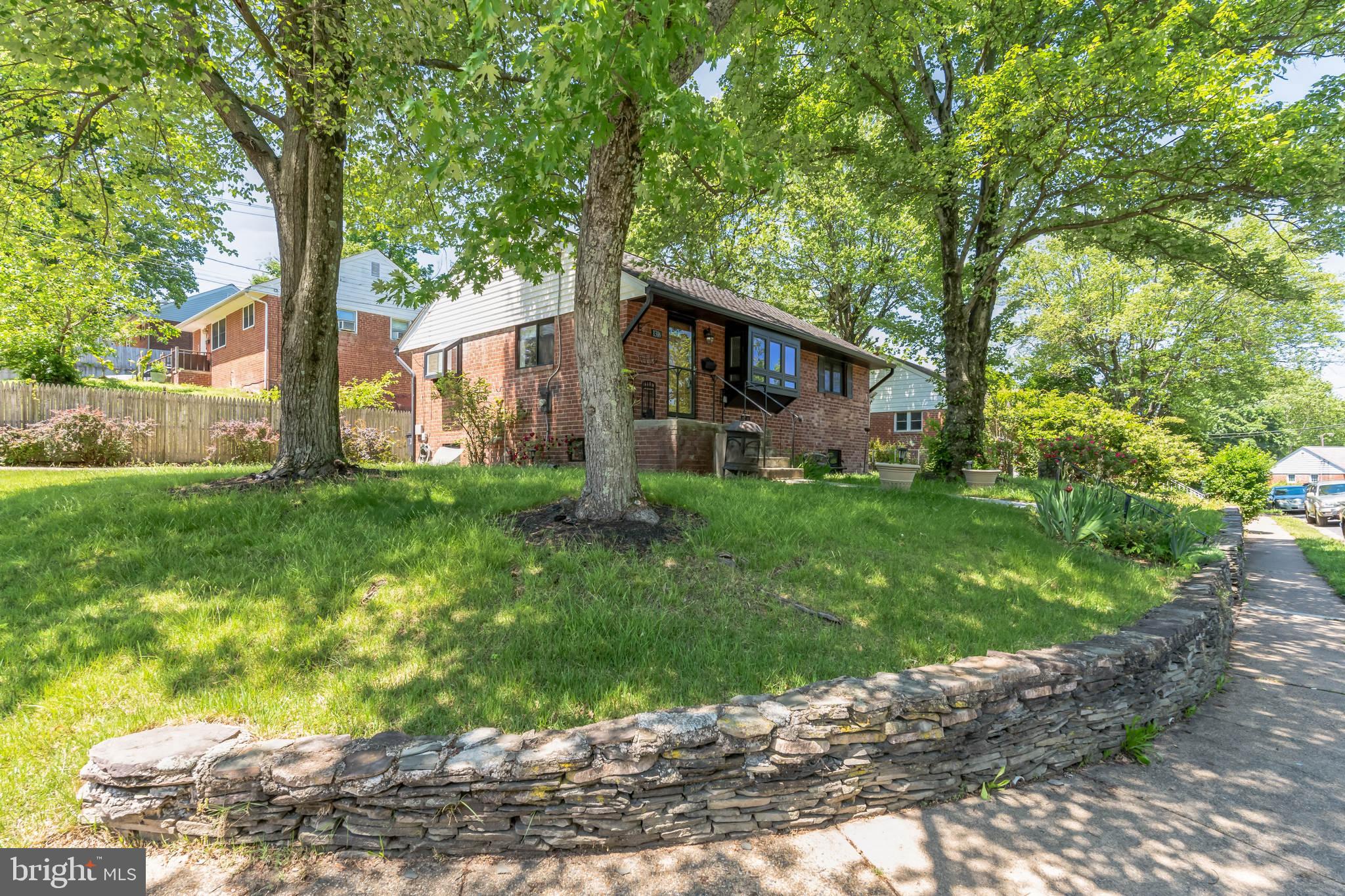 1316 South Buchanan Street Arlington, VA 22204 - Photo 8 of 28 a view of a house with yard and a tree