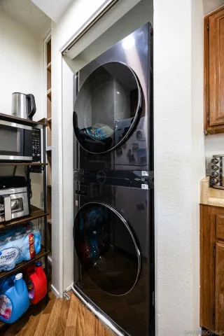 a kitchen with a washer and dryer