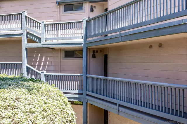 a view of a street from a balcony