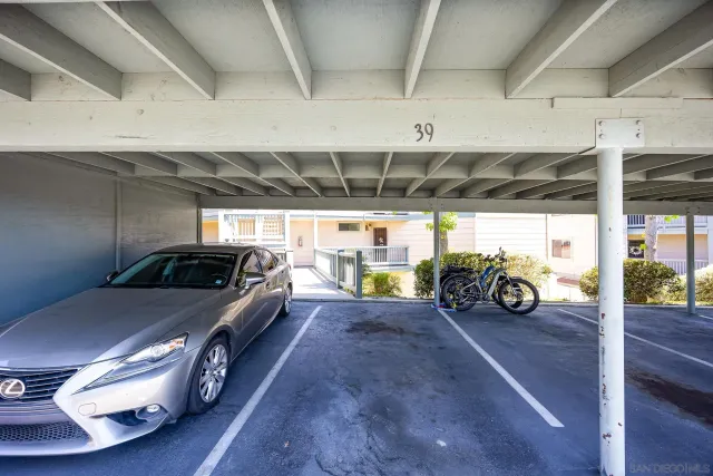 a car and bike parked in a garage