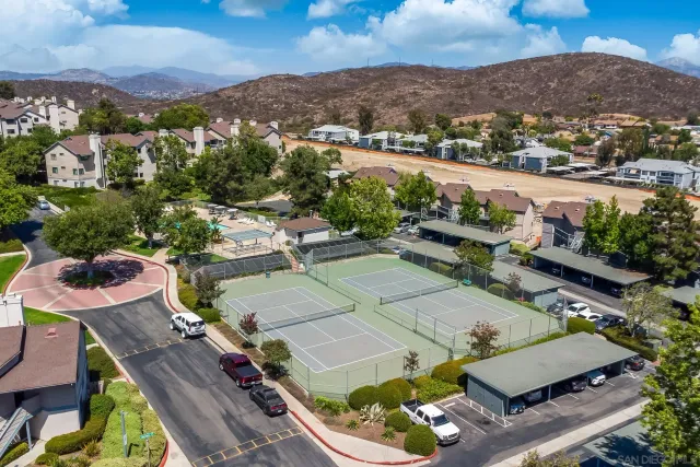 an aerial view of a house with a garden