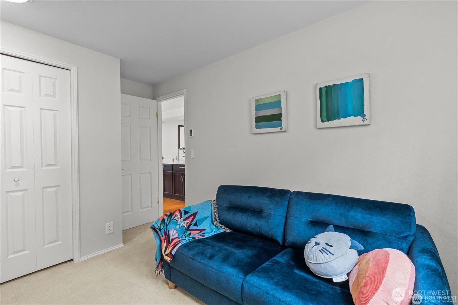 4222 Beach Drive Southwest, Unit 303 Seattle, WA 98116 - Photo 21 of 25 a living room with furniture and wooden floor