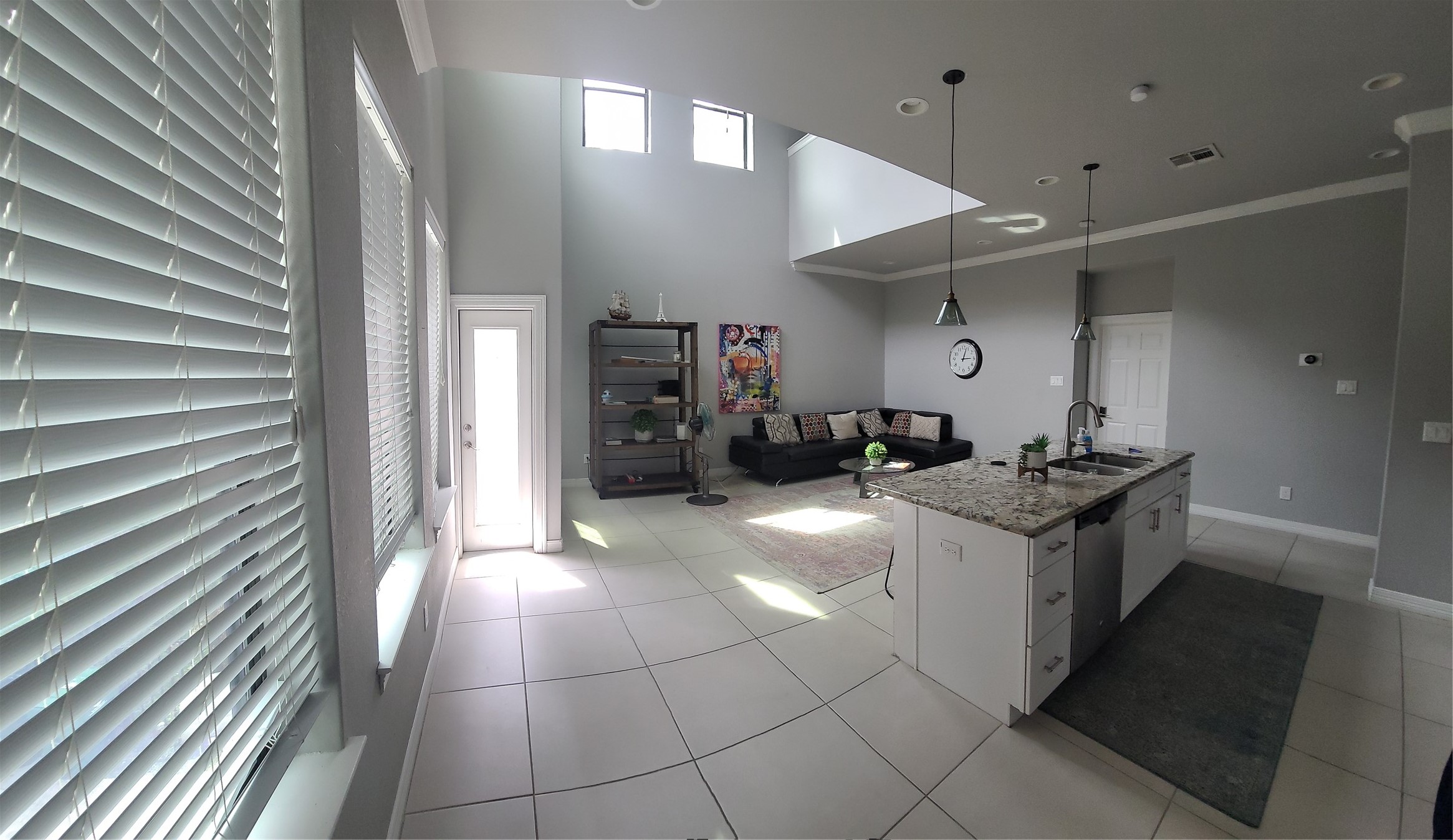 1413 Holly Street, Unit A Houston, TX 77007 - Photo 12 of 33 a kitchen with a sink and cabinets