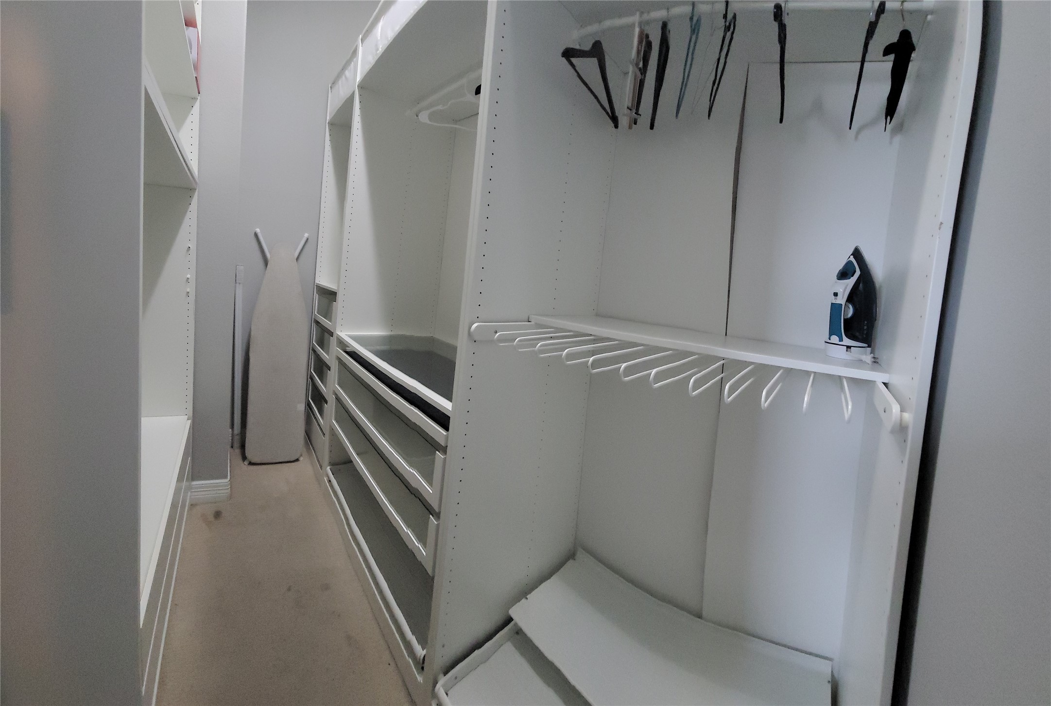 1413 Holly Street, Unit A Houston, TX 77007 - Photo 19 of 33 a view of walk in closet