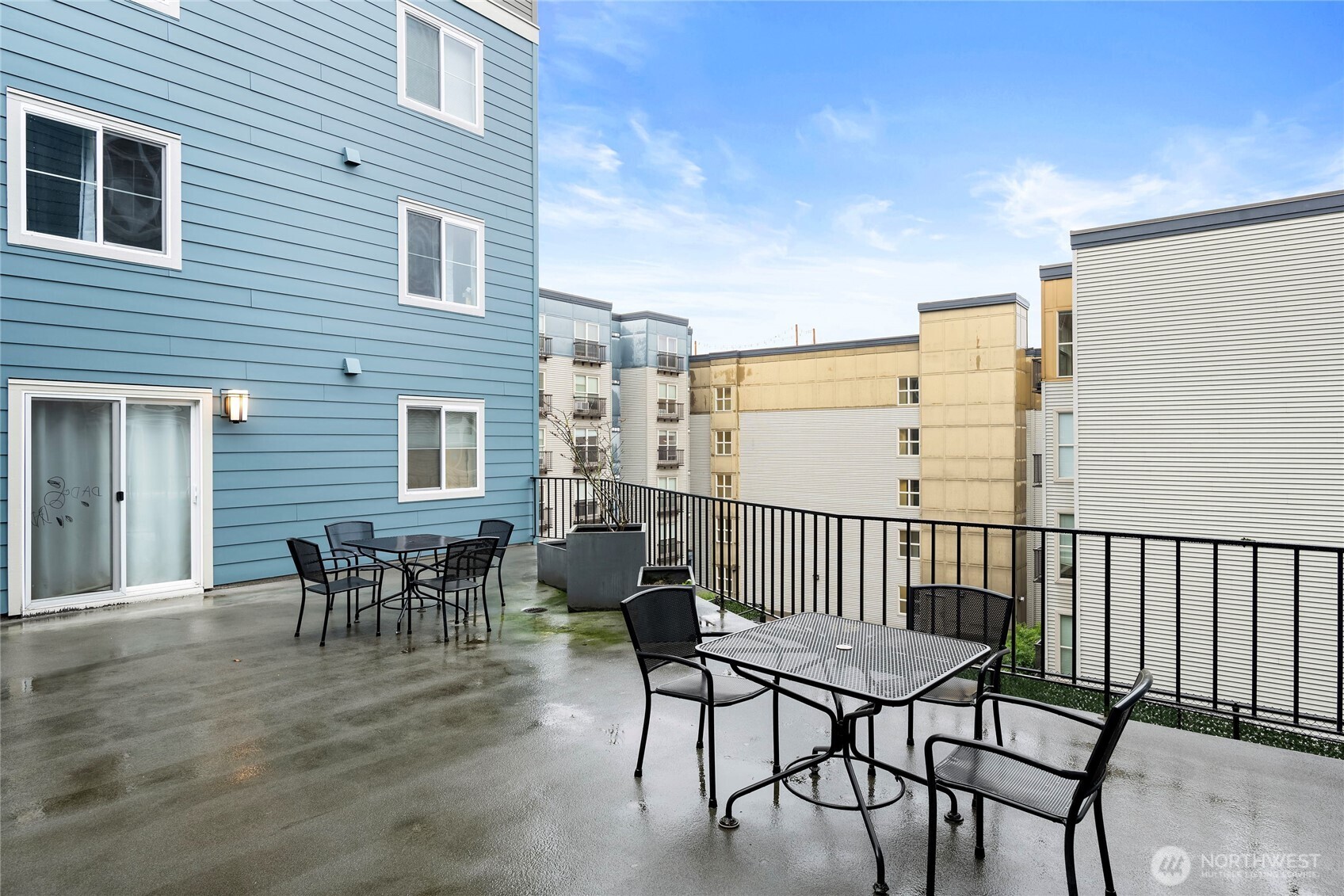 300 10th Avenue, Unit B105 Seattle, WA 98122 - Photo 28 of 40 a view of a chairs and table in the balcony