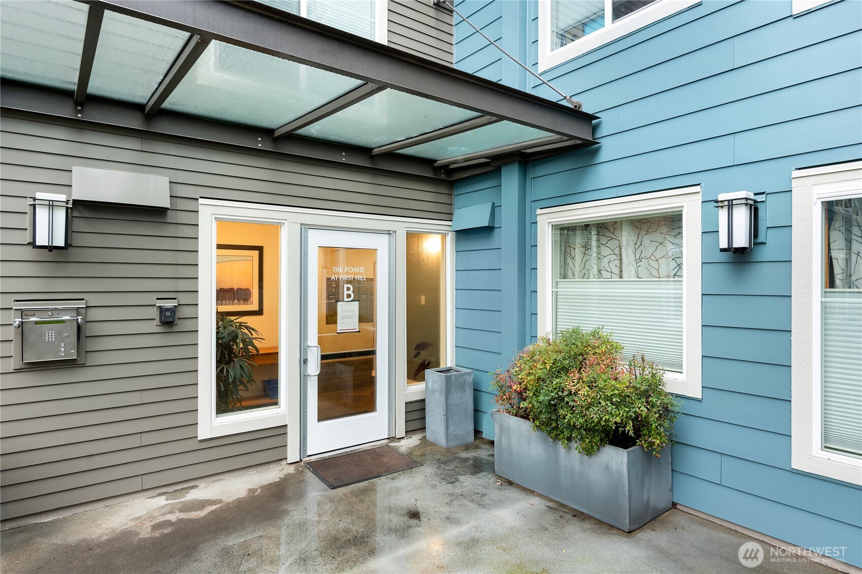 300 10th Avenue, Unit B105 Seattle, WA 98122 - Photo 3 of 40 a view of potted plants in front of door