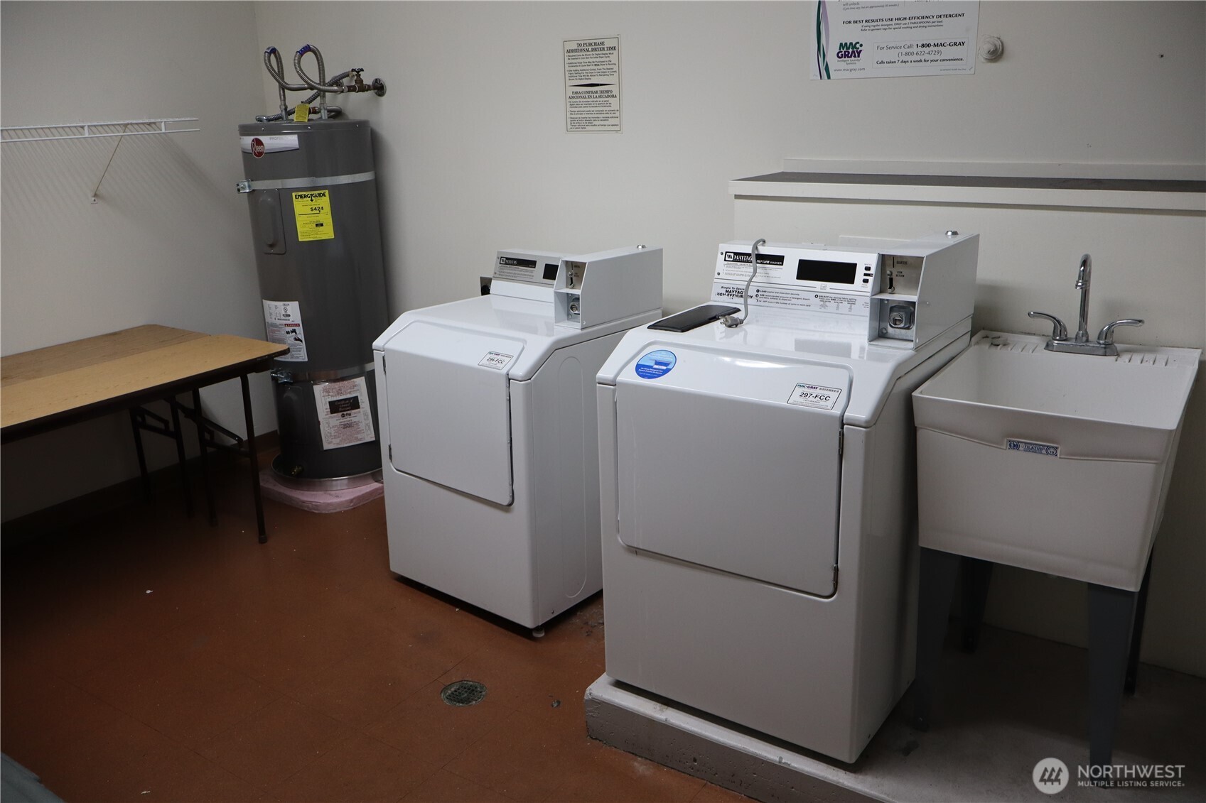 300 10th Avenue, Unit B105 Seattle, WA 98122 - Photo 32 of 40 a utility room with dryer and washer