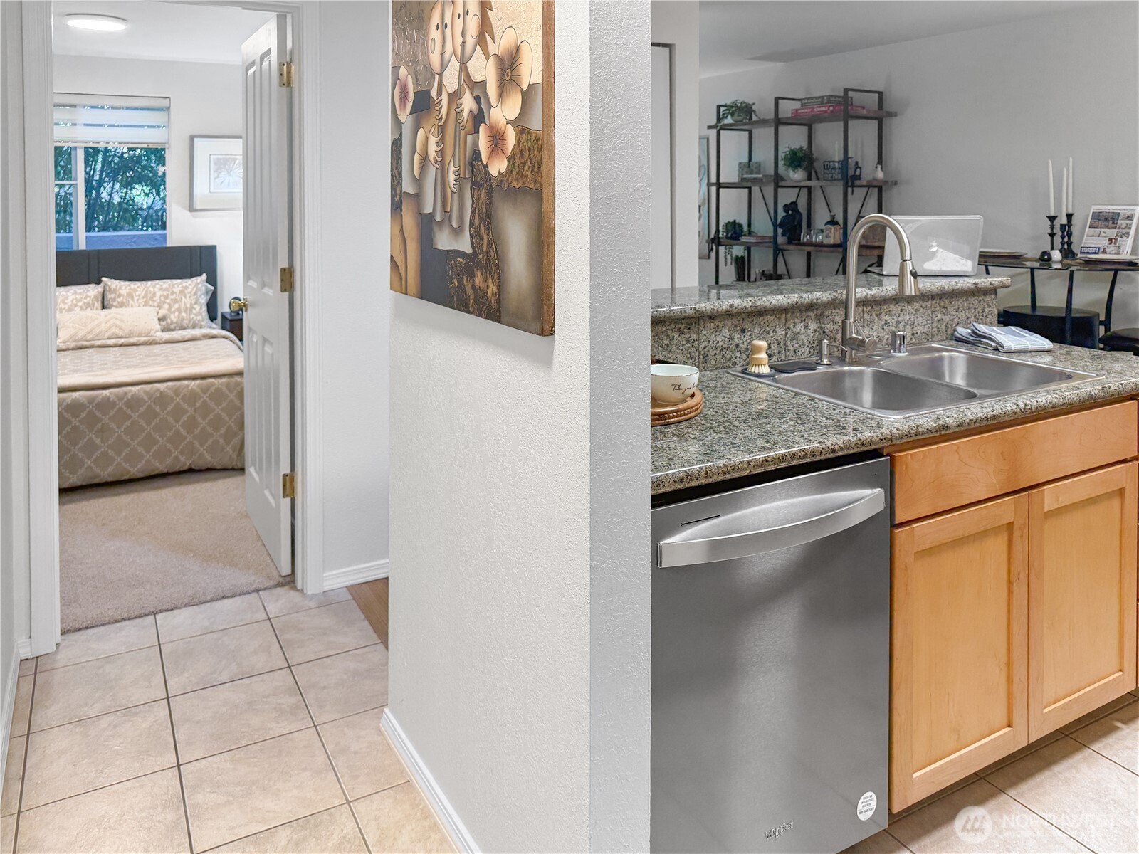 300 10th Avenue, Unit B105 Seattle, WA 98122 - Photo 5 of 40 a en suite bathroom with a granite countertop sink and a mirror