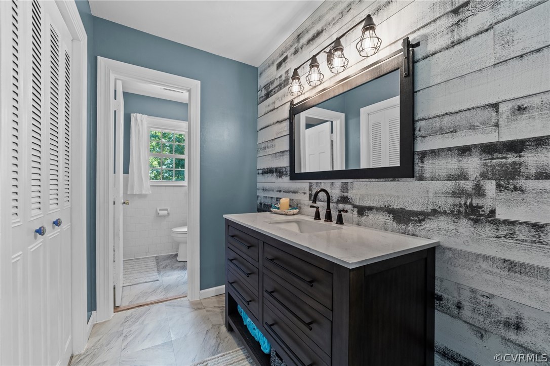 4201 Hidden Valley Road Chester, VA 23831 - Photo 15 of 30 a bathroom with a sink and a mirror