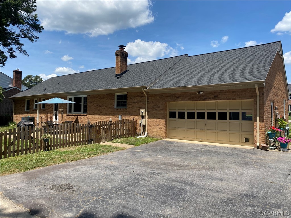 4201 Hidden Valley Road Chester, VA 23831 - Photo 24 of 30 a front view of a house with a garden