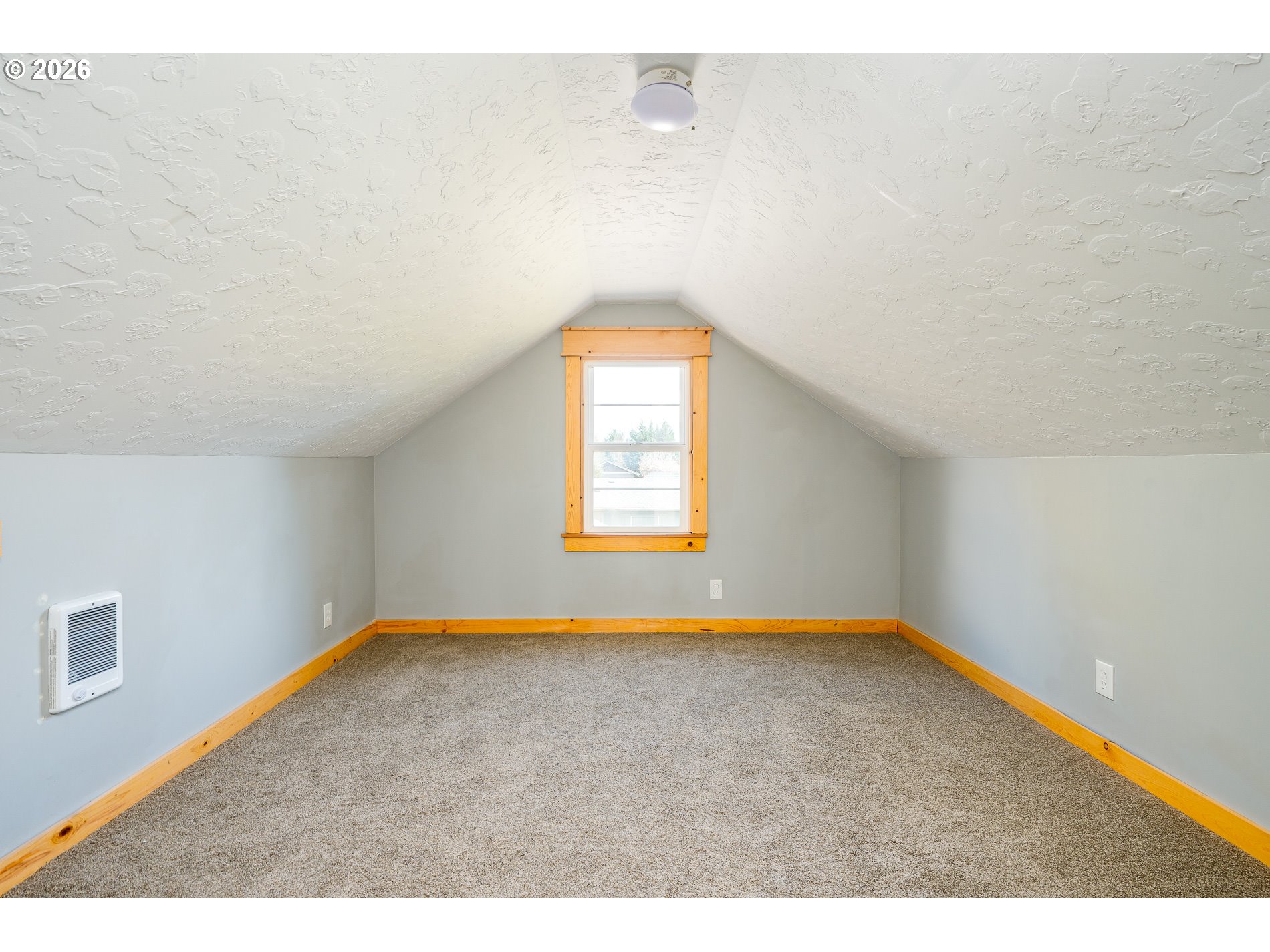 1520 North Maple Street Canby, OR 97013 - Photo 23 of 46 a view of an empty room with a window
