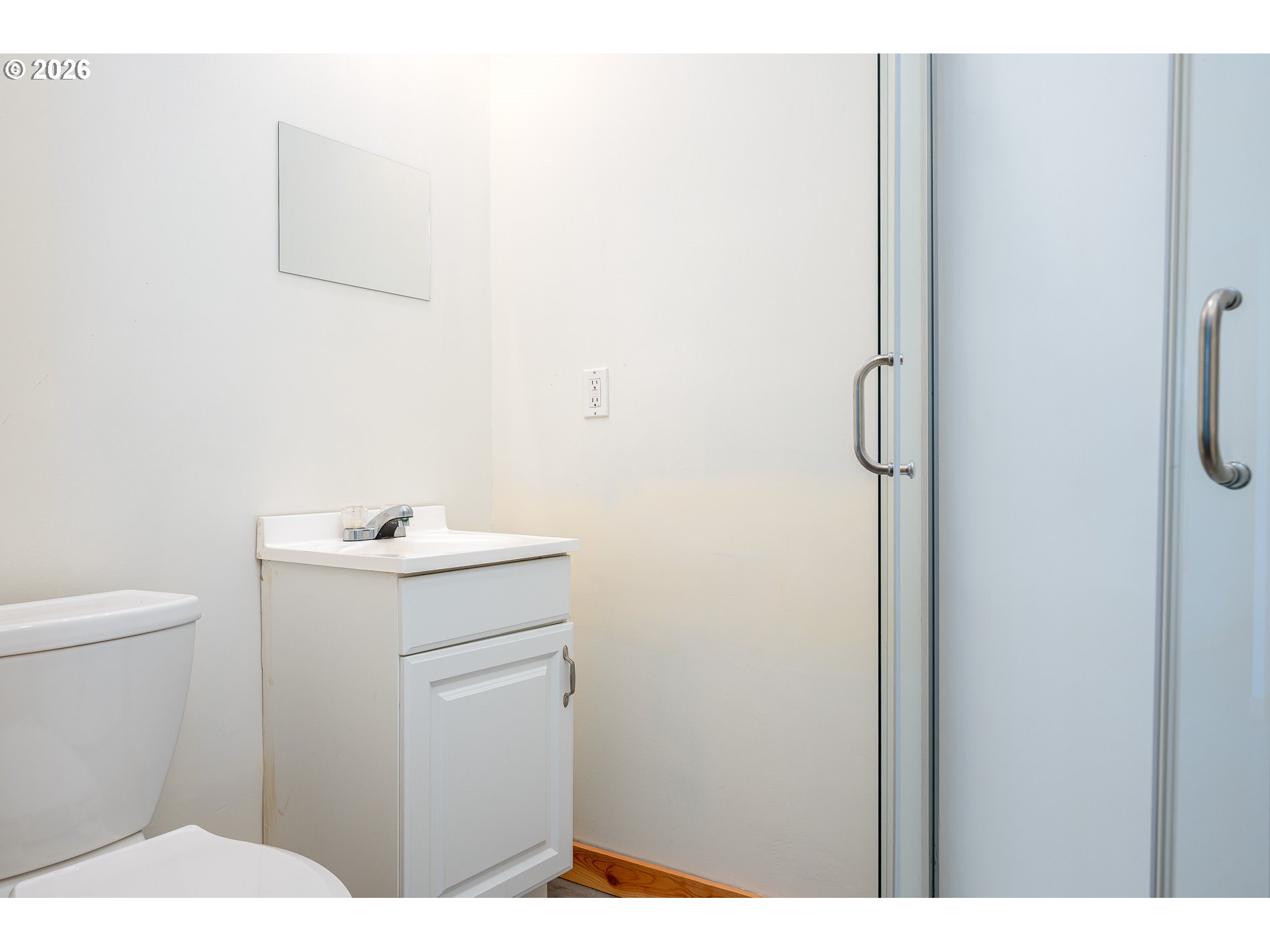 1520 North Maple Street Canby, OR 97013 - Photo 34 of 46 a bathroom with a sink and a toilet