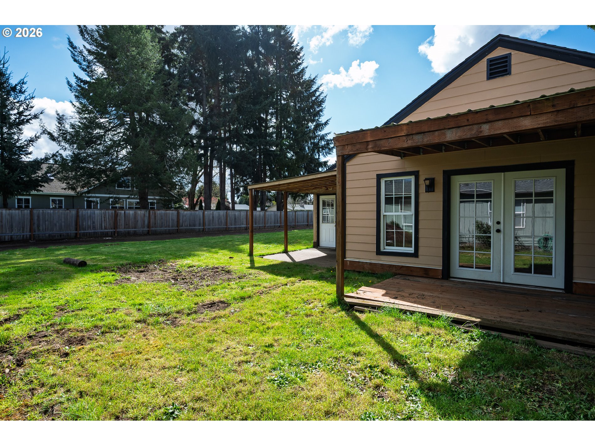 1520 North Maple Street Canby, OR 97013 - Photo 46 of 46 a view of a house with backyard and porch