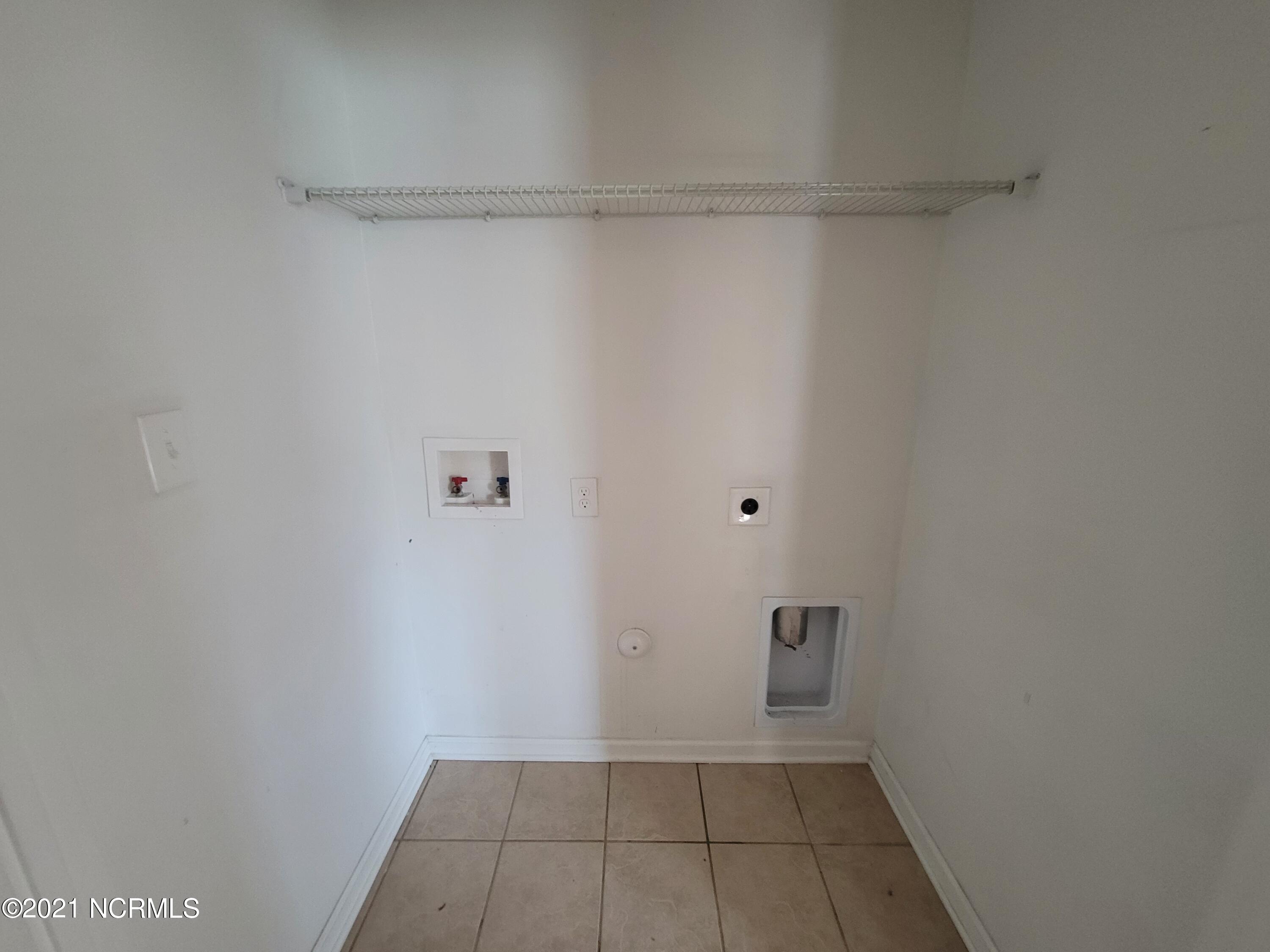 335 Tall Pine Road Havelock, NC 28532 - Photo 24 of 28 Laundry Closet