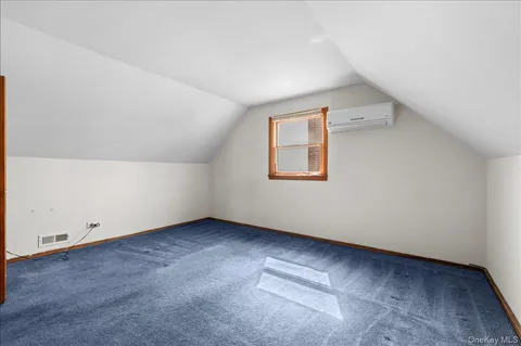 an empty room with a workbench