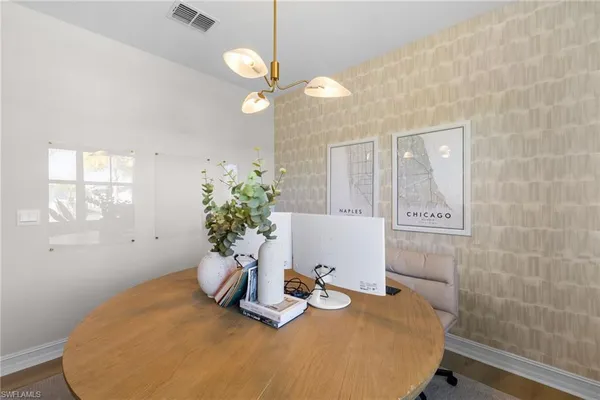 a view of a dining room with furniture