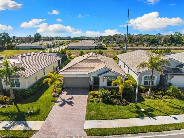 a aerial view of a house with a garden and plants