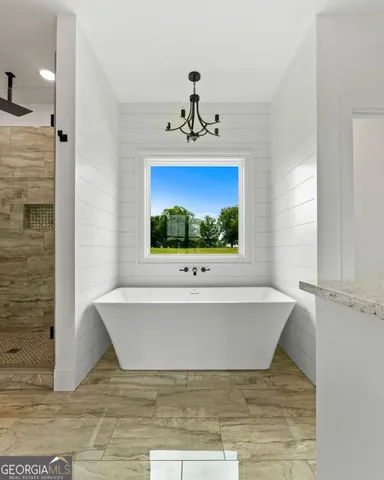 a view of a living room with a sink and window