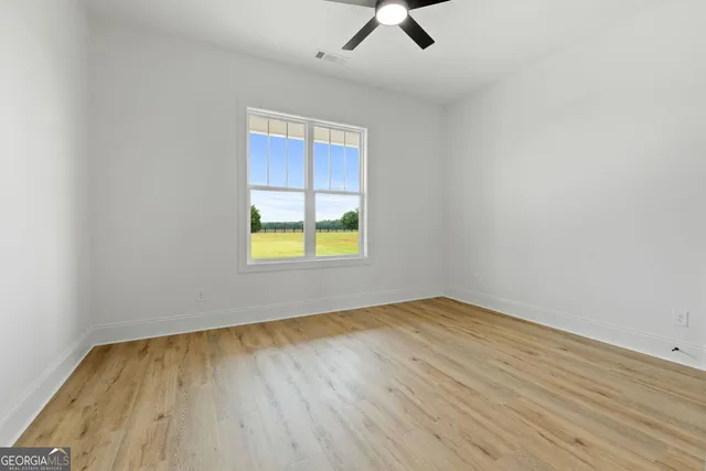 an empty room with window