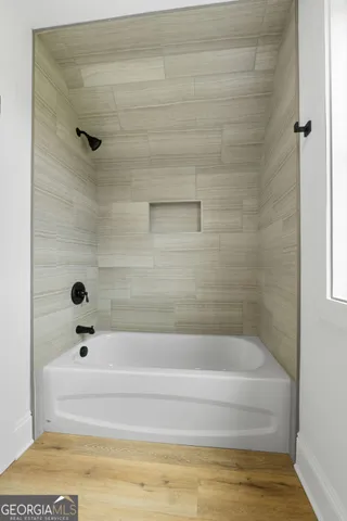 a bathroom with a bathtub