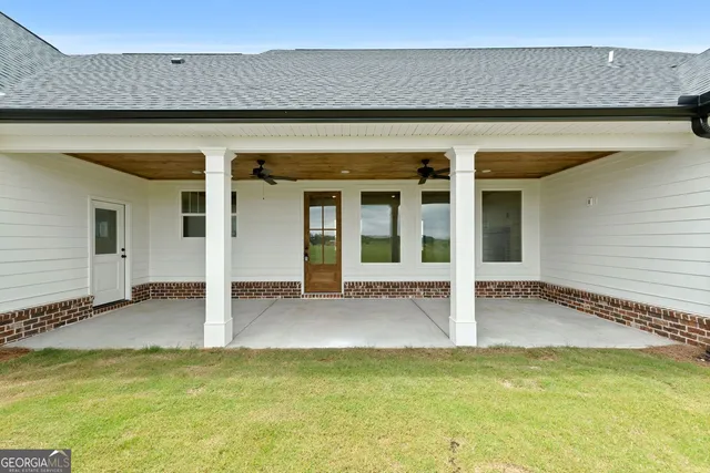 a view of a balcony with hardwood