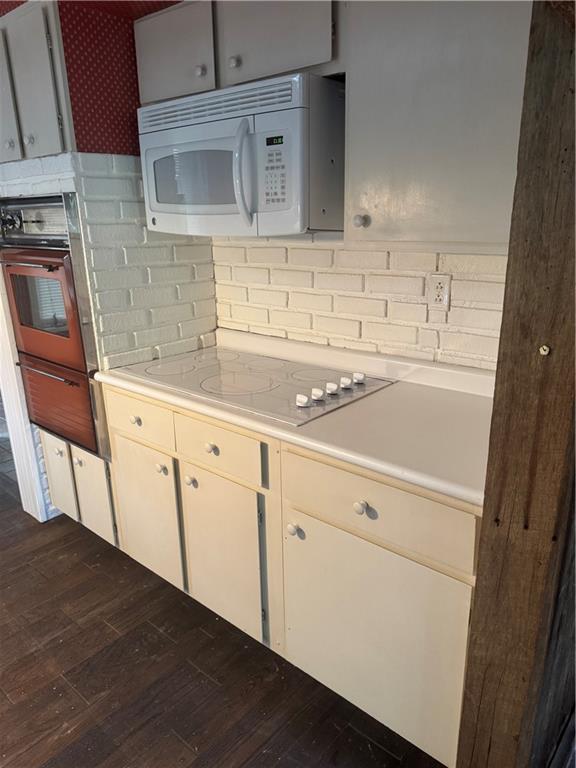 117 Chestnut Ridge Road Acme, PA 15610 - Photo 11 of 36 a kitchen with granite countertop white cabinets and white appliances