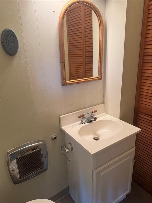 117 Chestnut Ridge Road Acme, PA 15610 - Photo 17 of 36 a bathroom with a sink and a mirror