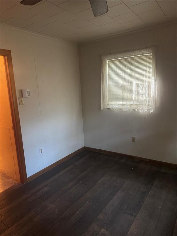 117 Chestnut Ridge Road Acme, PA 15610 - Photo 22 of 36 an empty room with wooden floor and windows