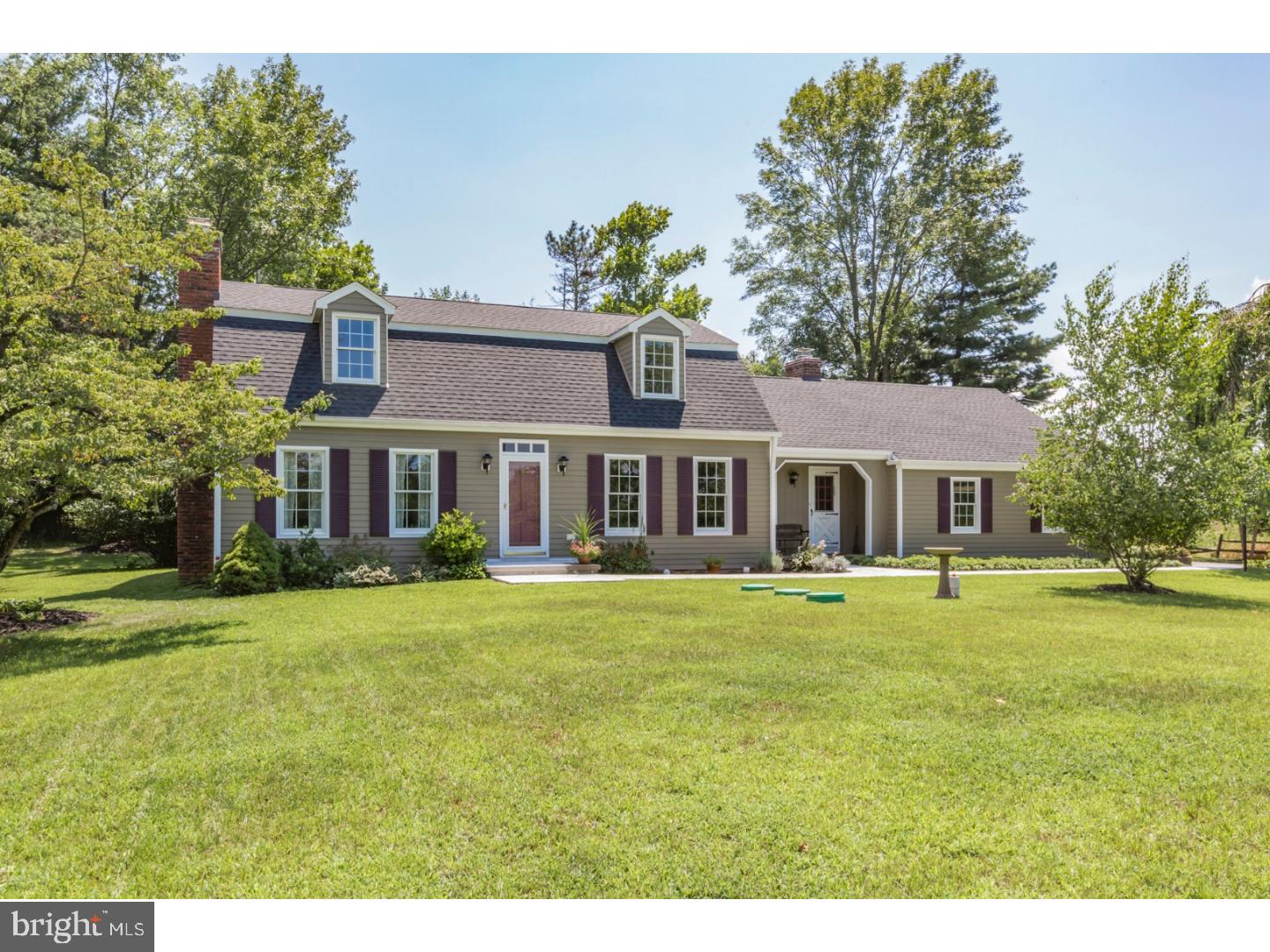 469 Federal City Road Pennington, NJ 08534 - Photo 1 of 25 a front view of a house with a garden