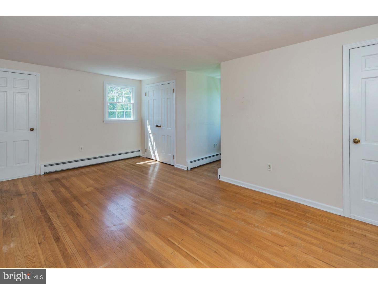 469 Federal City Road Pennington, NJ 08534 - Photo 16 of 25 a view of an empty room with wooden floor and a window