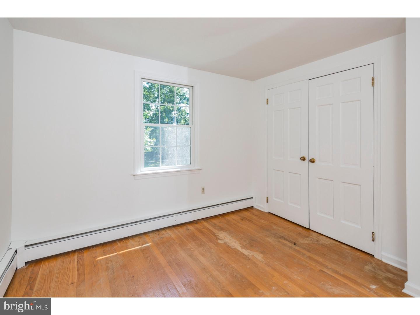 469 Federal City Road Pennington, NJ 08534 - Photo 19 of 25 a view of an empty room with a window