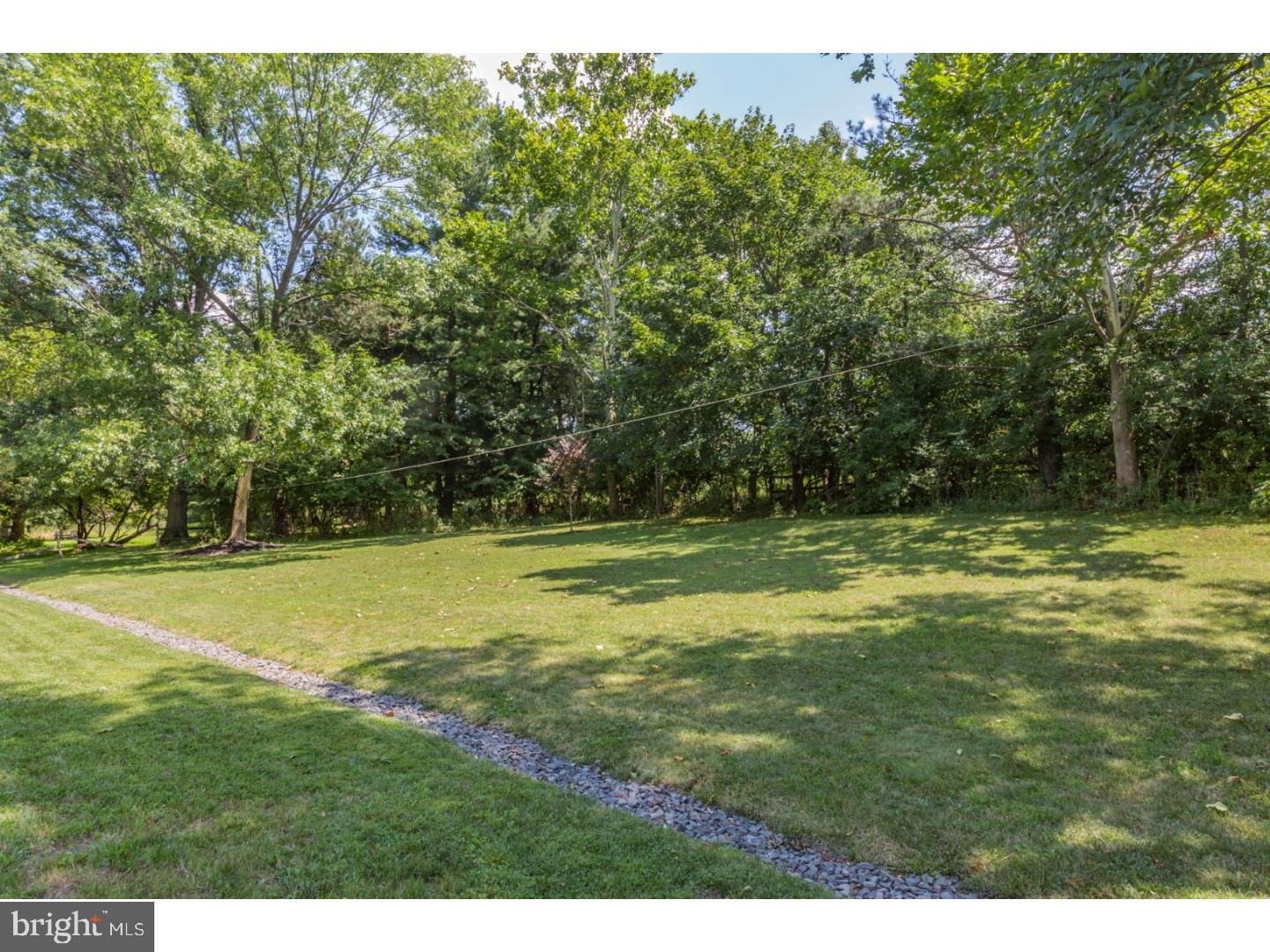 469 Federal City Road Pennington, NJ 08534 - Photo 24 of 25 a view of a field with a tree