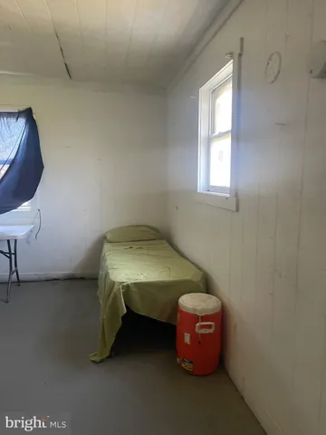 a room with a table and a window